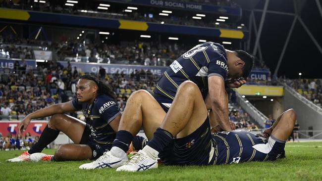 A dejected Cowboys after losing the NRL Preliminary Final match against the Parramatta Eels. Picture: Ian Hitchcock/Getty Images