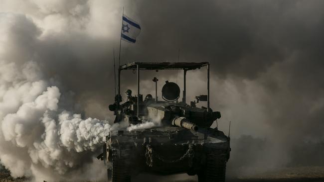 An Israeli tank moves along the border with the Gaza Strip on January 24 in southern Israel, Israel.  Picture: Amir Levy/Getty Images