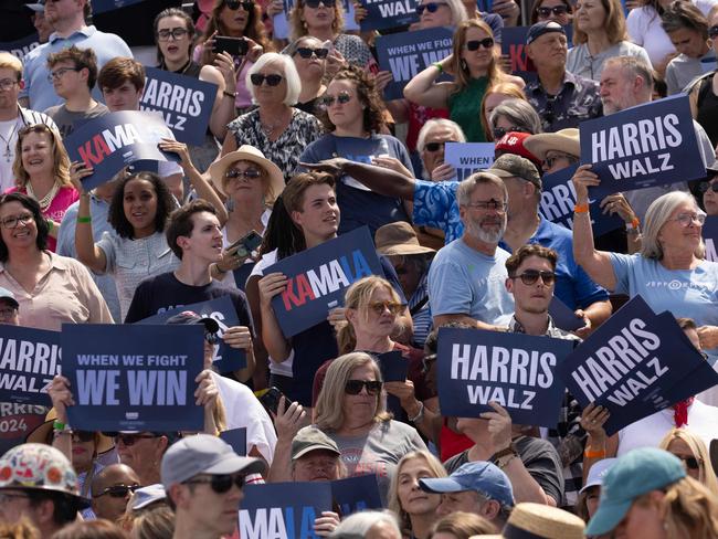 People attend a campaign rally with Democratic presidential candidate Vice President Kamala Harris and her running mate Democratic vice presidential candidate, Minnesota Gov. Tim Walz on August 7, 2024 in Eau Claire, Wisconsin. (Photo by SCOTT OLSON / GETTY IMAGES NORTH AMERICA / Getty Images via AFP)