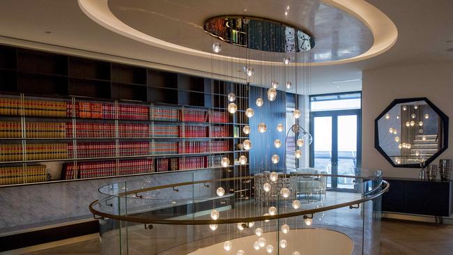 The refurbished Soul penthouse in Surfers Paradise. Andrew Koloadin’s Queensland law books dating back to the mid-19th Century are pictured in the background. Picture: Jerad Williams