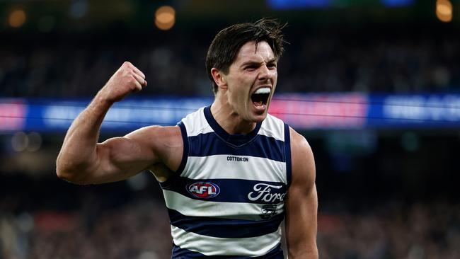 MELBOURNE, AUSTRALIA - JULY 12: Oliver Henry of the Cats celebrates a goal during the 2024 AFL Round 18 match between the Collingwood Magpies and the Geelong Cats at Melbourne Cricket Ground on July 12, 2024 in Melbourne, Australia. (Photo by Michael Willson/AFL Photos via Getty Images)