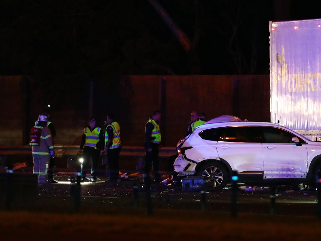 Emergency services on the scene of a crash in Melbourne. Picture: Aaron Francis
