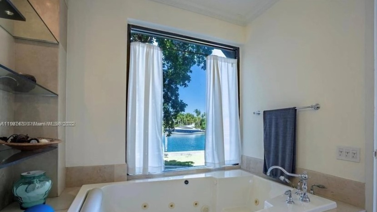 The primary bath has a deep soaking tub and water views. Picture: Realtor