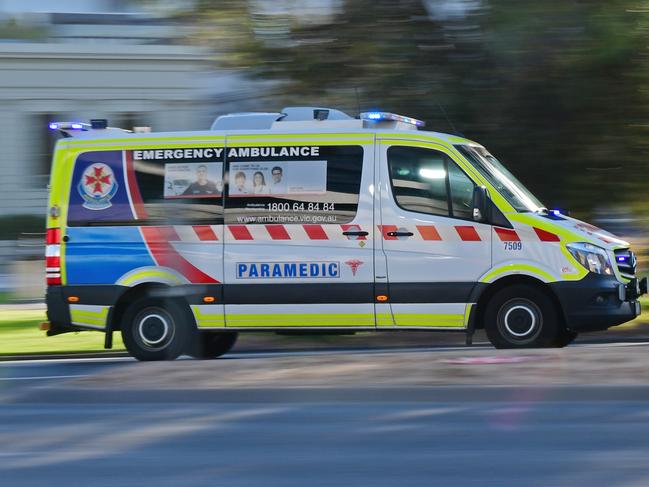 Monbulk player Clayton Spooner was taken by ambulance to The Alfred hospital. He was cleared of serious injury. Picture: Stephen Harman