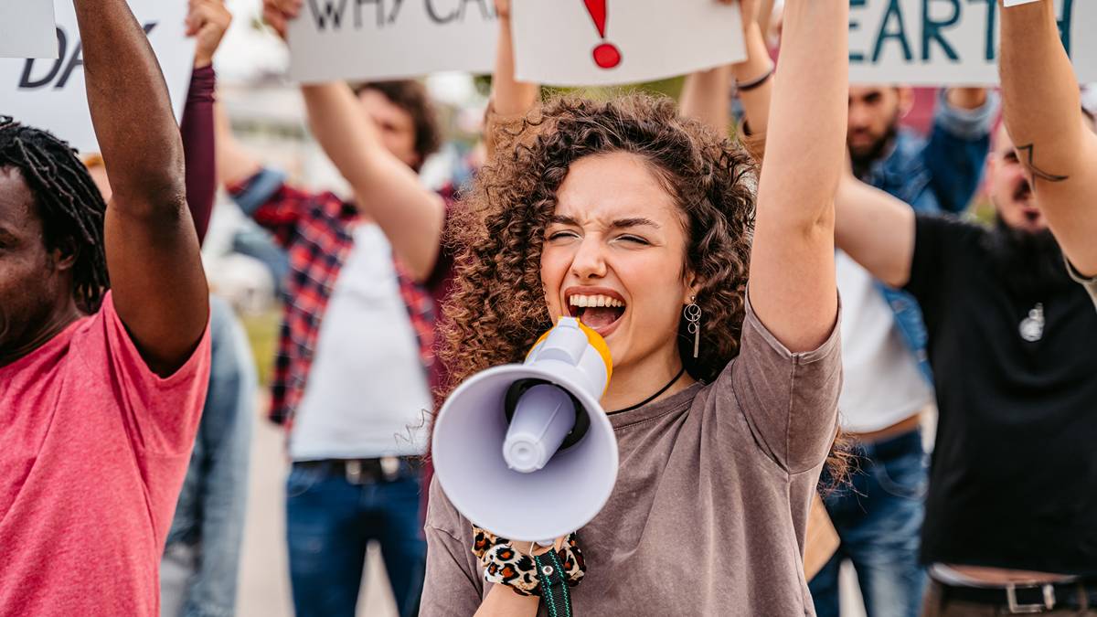 Woodside had another tense AGM this year, interrupted by climate protestors and a mini shareholder revolt. Pic: Getty Images