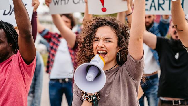Woodside had another tense AGM this year, interrupted by climate protestors and a mini shareholder revolt. Pic: Getty Images