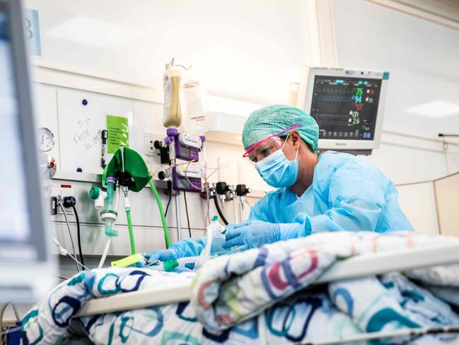 A nurse tends to a coronavirus infected patient at the intensive care unit at Bispebjerg Hospital in Copenhagen Denmark. Picture: Ólafur Steinar Gestsson/Ritzau Scanpix/AFP