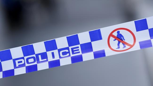 Generic image of police tape outside a crime scene on William Street in the Melbourne CBD on Wednesday, February 5, 2020. (AAP Image/James Ross) NO ARCHIVING