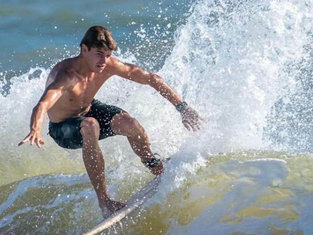 Marley Lowcock surfing