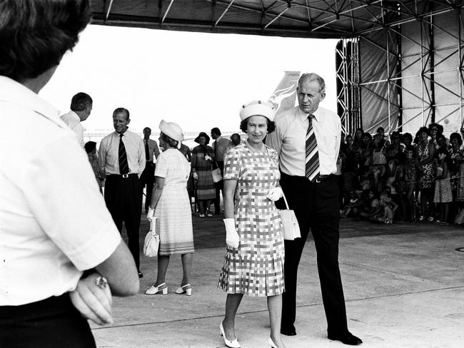 Former Administrator of the Northern Territory John England escorts Queen Elizabeth and Prince Philip. Picture: NT News staff photographer.