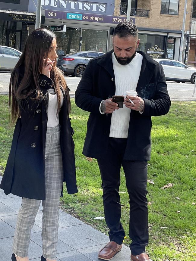 Sleiman Elali (right) with his wife outside of Bankstown Local Court. Picture: Paul Brescia