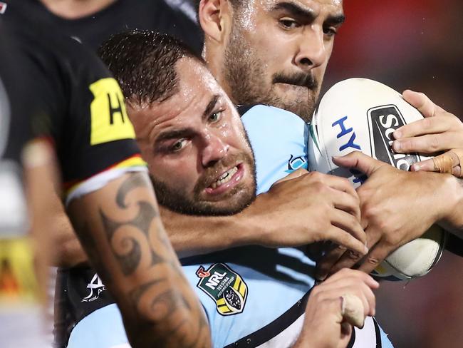 PENRITH, AUSTRALIA - JULY 13:  Wade Graham of the Sharks is tackled during the round 18 NRL match between the Panthers and the Sharks at Panthers Stadium on July 13, 2018 in Penrith, Australia.  (Photo by Matt King/Getty Images)