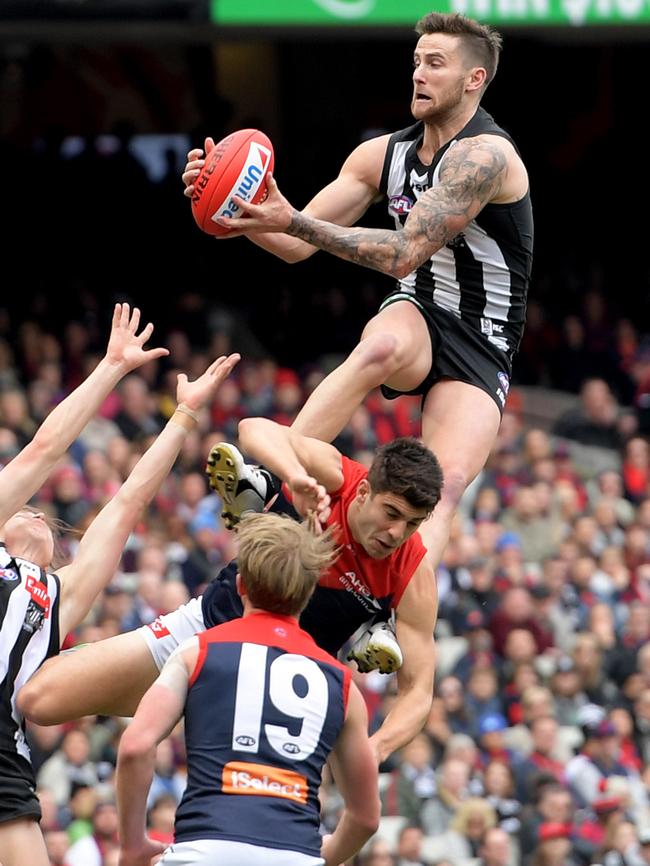 Jeremy Howe takes a hanger over Christian Petracca.