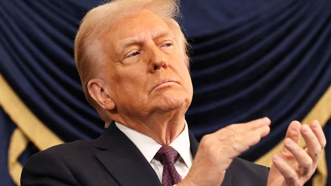 WASHINGTON, DC - JANUARY 20: U.S. Vice President J.D. Vance and U.S. President Donald Trump react during inauguration ceremonies in the Rotunda of the U.S. Capitol on January 20, 2025 in Washington, DC. Donald Trump takes office for his second term as the 47th president of the United States.   Chip Somodevilla/Getty Images/AFP (Photo by CHIP SOMODEVILLA / GETTY IMAGES NORTH AMERICA / Getty Images via AFP)