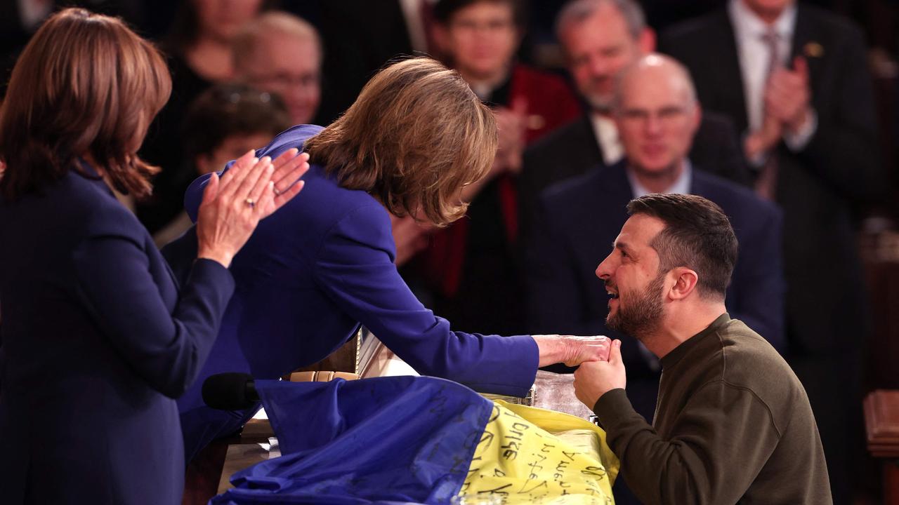 Volodymyr Zelenskyy shakes hands with US Speaker of the House Nancy Pelosi. Picture: AFP