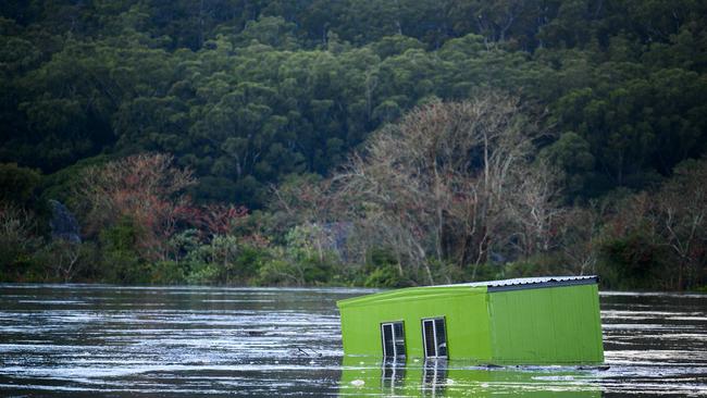 A shed floats down Shoalhaven River. Picture: Darren Leigh Roberts