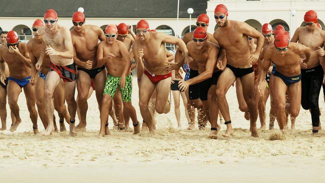 Racers get underway at the start of the 2km race. The Bondi Bluewater challenge Ocean swiming race. Picture: John Appleyard