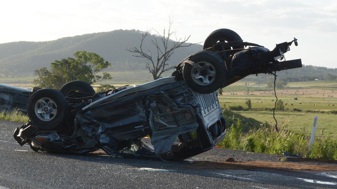 The occupants of this upturned vehicle escaped serious injuries. Picture: Michael Nolan