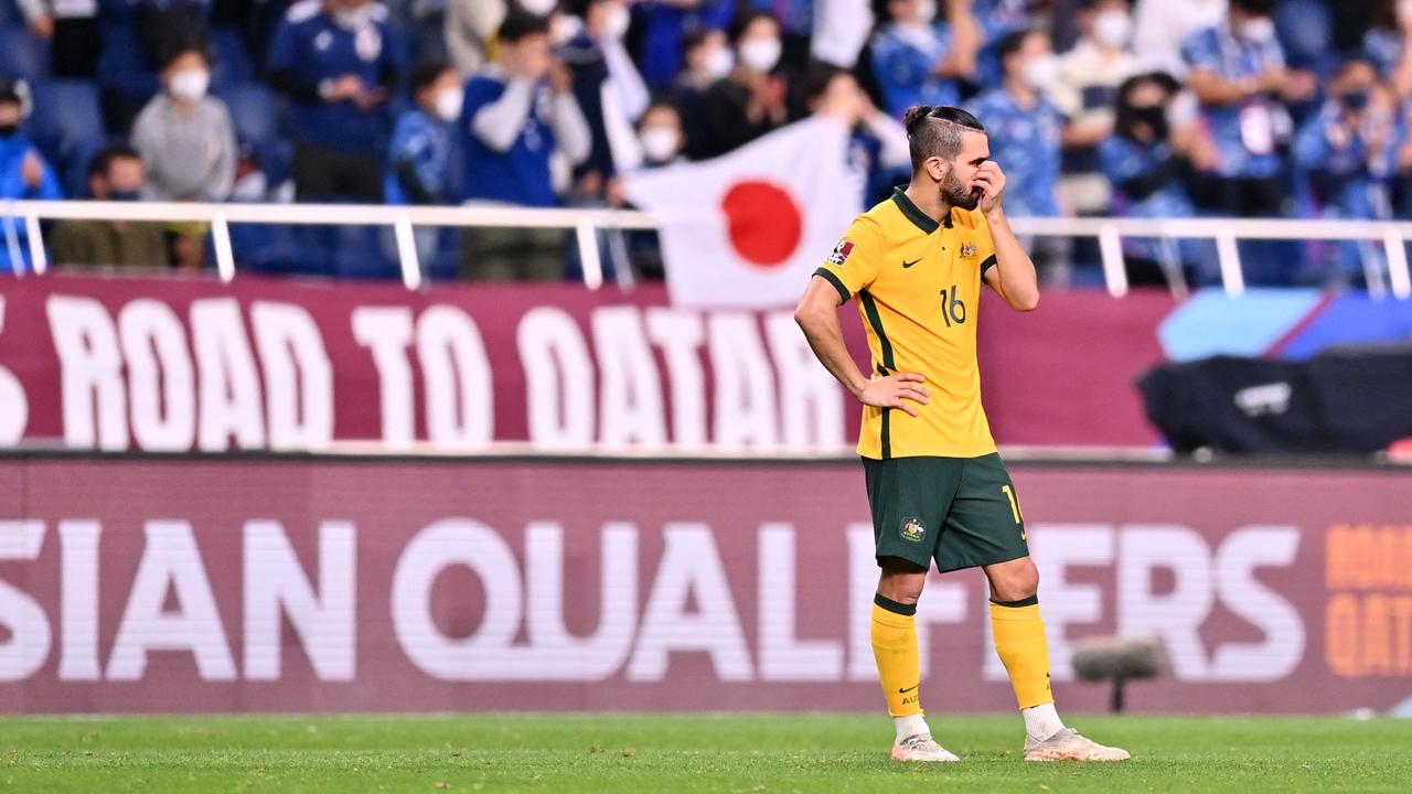 Australia's Aziz Behich reacts after losing the 2022 Qatar World Cup qualifier to Japan.