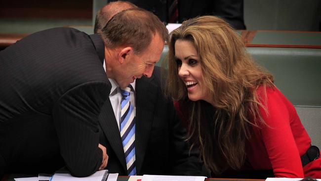 Opposition leader Tony Abbott talks with his Chief of Staff Peta Credlin during Question Time today in the House of Representatives, Federal Parliament.
