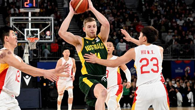 White drives to the basket against China in the recent World Cup qualifier in Melbourne. Picture: AFP