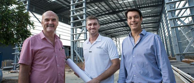 Maritimo operations general manager Phil Candler (left), lead designer Tom Barry-Cotter and CEO Garth Corbitt at the boat builder's new expanded manufacturing base sheds which has almost doubled its factory footprint at Coomera Marine Precinct Picture: Murray Waite