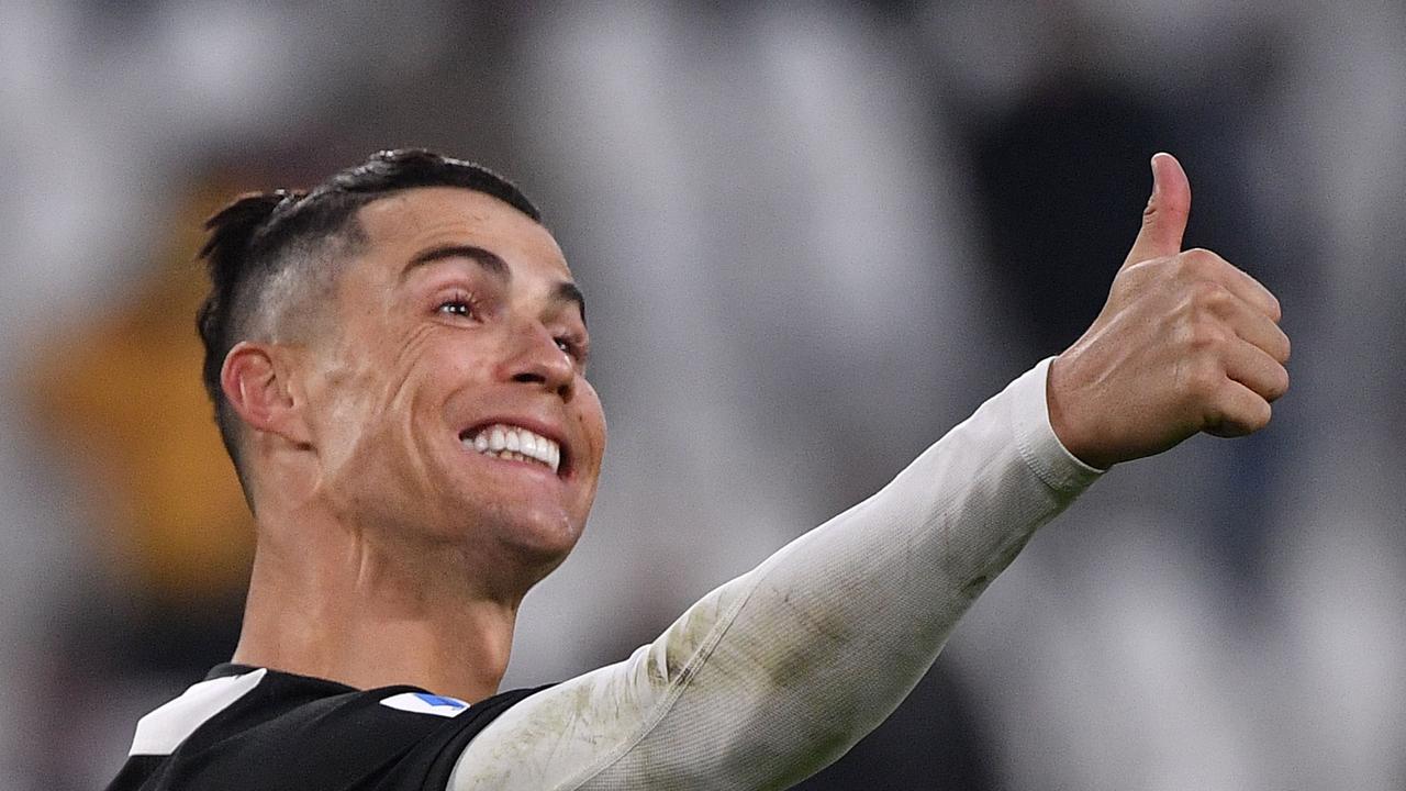 Cristiano Ronaldo presented with GOAT shirt by Juventus after