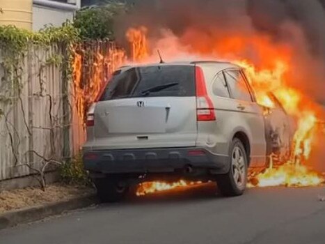 Tradie Josh Alexander Scott has faced the Brisbane Magistrates Court charged with a hit and run that claimed the life of a 75-year-old man. A vehicle engulfed in flames near where a man was killed in a hit and run in Chermside Picture: Supplied