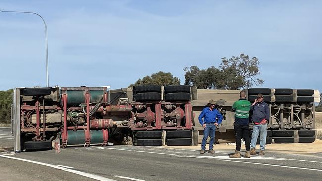 Highway users are being asked to avoid the area while the truck is removed. Picture: Isaac Selby