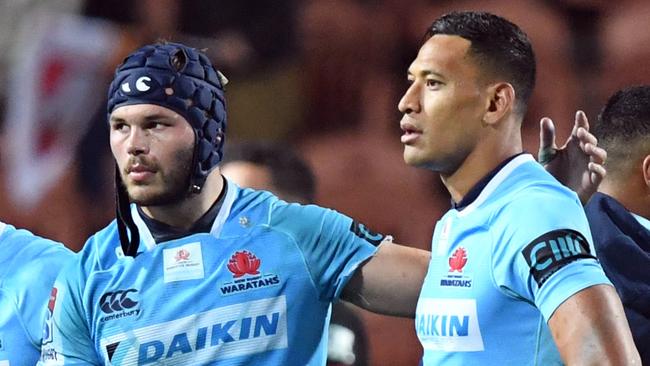 Michael Wells of the Waratahs (left) and Israel Folau after their loss to the Waratahs in the Super Rugby match between the Waratahs and the Chiefs at Waikato Stadium in Hamilton, New Zealand, May 26, 2018.  (AAP Image/SNPA, Ross Setford) NO ARCHIVING, EDITORIAL USE ONLY