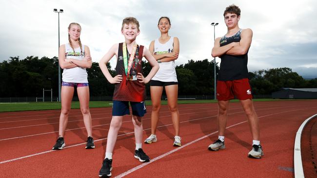 Kaitlyn McGee, 14, Lewis Williams, 10, Leah Goode, 16, and Nicholas Berther, 16, are all promising runners with potential to compete at the Brisbane Olympics in 2032. Picture: Brendan Radke