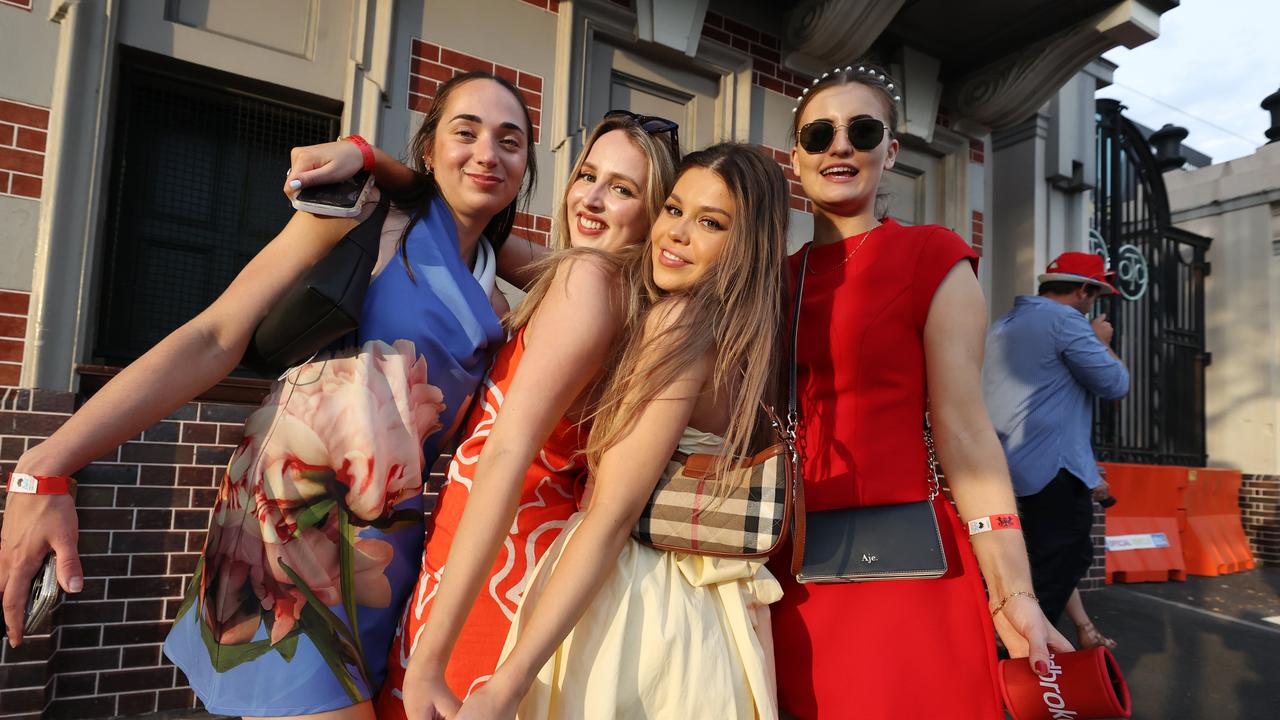 Punters leave Eagle Farm racecourse on Melbourne Cup Day.