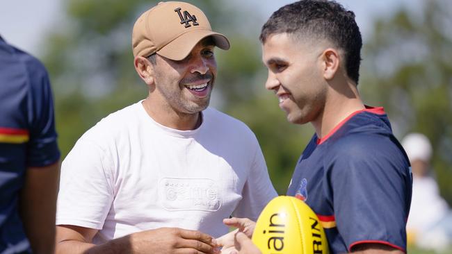 Eddie Betts chats with his former teammate and apprentice Tyson Stengle ahead of the Crows’ game against Melbourne on Saturday. Picture: AAP Image/Michael Dodge