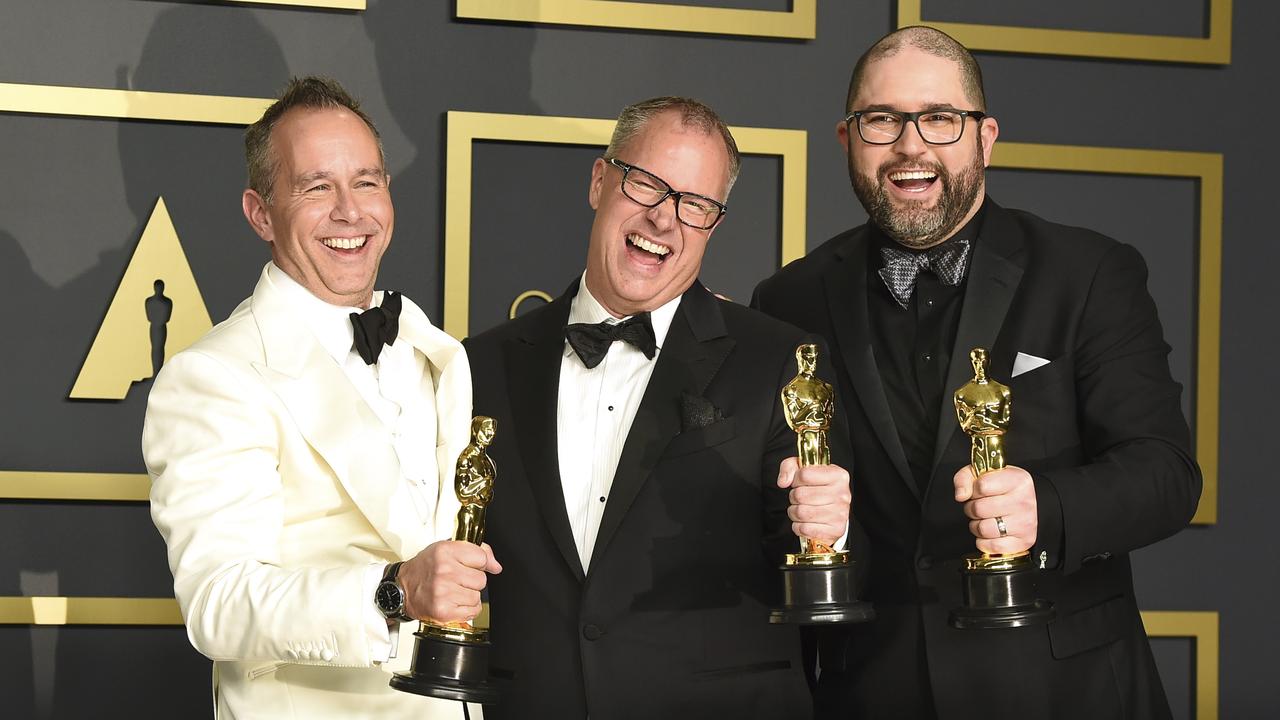 Best Animated Feature Film: <i>Toy Story 4</i>. Pictured from left; Jonas Rivera, Mark Nielsen and Josh Cooley accept the award. Picture: AP