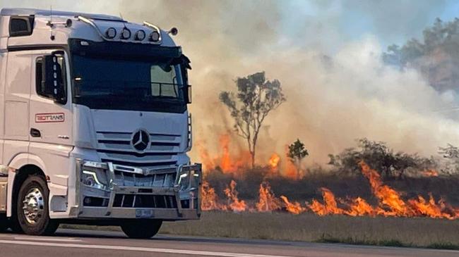 Fire engulfs an area near Julago on Wednesday, October 16, forcing police to put in safety measures. Photo: Daneka Hill.