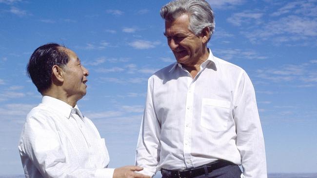 Former Chinese Communist Party general secretary Hu Yaobang surveys the Pilbara's mountains of iron with Bob Hawke in 1985.