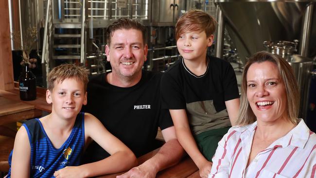 Mick and Claire Neil with sons Zac, 12, and Jared, 10, at Philter Brewing at Marrickville in Sydney’s inner west. Picture: John Feder