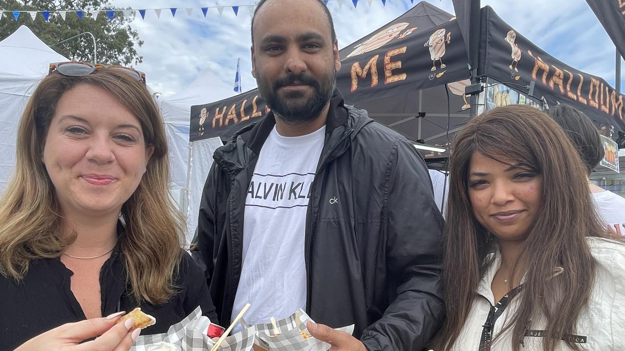 Claire King, Amrit Singh and Manisha Samal snack on halloumi.