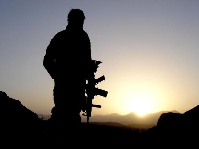 Caption: An Australian Special Operations Task Group soldiers observing the valley during the Shah Wali Kot Offensive.  Mid Caption: Shah Wali Kot Offensive   Afghan National Security Forces (ANSF) partnered with Australian Special Forces from the Special Operations Task Group conducted a deliberate operation to clear a Taliban insurgent stronghold in the Shah Wali Kot region of northern Kandahar province.  The Shah Wali Kot Offensive comprised synchronised and deliberate clearance operations involving Australian Commandos combined with a number of surgical helicopter-born assaults from Special Air Service (SAS) troops on key targets.  Removing Taliban insurgents from Afghan communities allows the Government of Afghanistan to establish a presence and gain the trust of the community to provide them with necessary infrastructure and security that was not provided by the insurgents. Picture: Department of Defence