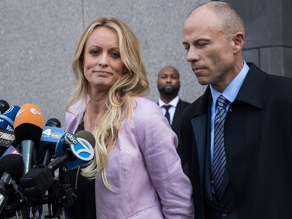 Adult film actress Stormy Daniels and her lawyer Michael Avenatti, who is now accused of threatening to extort $20 million from Nike. Picture: AFP/Getty Images North America