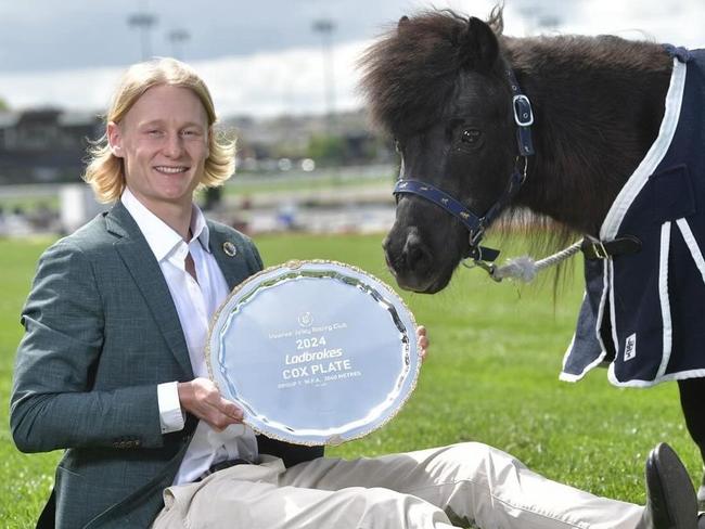 Ollie Dempsey with the Cox Plate. Picture: Instagram