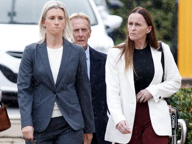Hero police officer Amy Scott (left) arrives at the Lidcombe Coroners Court. Picture: Nikki Short