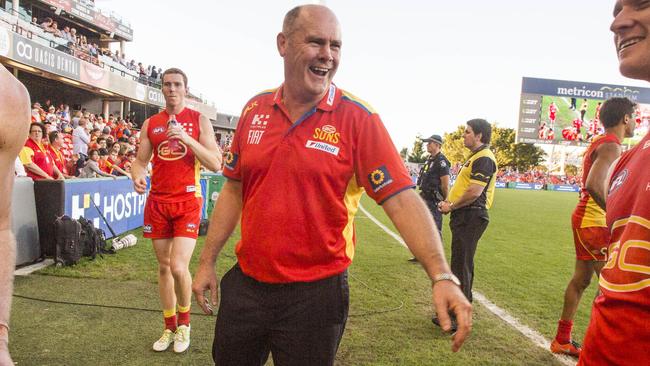 Rodney Eade shares a laugh with his players.