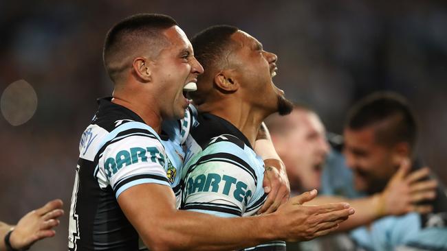 SYDNEY, AUSTRALIA — OCTOBER 02: Sharks players celebrate winning the 2016 NRL Grand Final match between the Cronulla Sharks and the Melbourne Storm at ANZ Stadium on October 2, 2016 in Sydney, Australia. (Photo by Cameron Spencer/Getty Images)