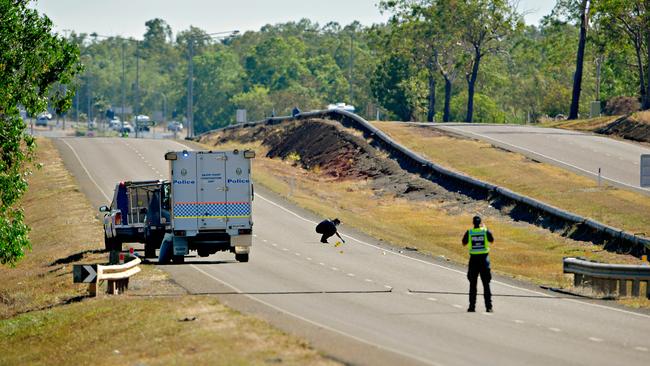 NT Police major crash investigators on scene where the woman was killed in 2018.