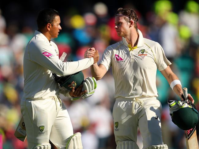 SYDNEY, AUSTRALIA - JANUARY 05:  Usman Khawaja of Australia and Steve Smith of Australia leave the field at the conclusion of play during day two of the Fifth Test match in the 2017/18 Ashes Series between Australia and England at Sydney Cricket Ground on January 5, 2018 in Sydney, Australia.  (Photo by Cameron Spencer/Getty Images)