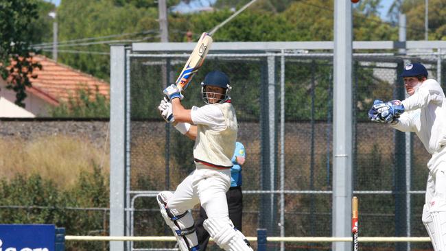 James Pattinson batting for Dandenong against Geelong in early 2013.