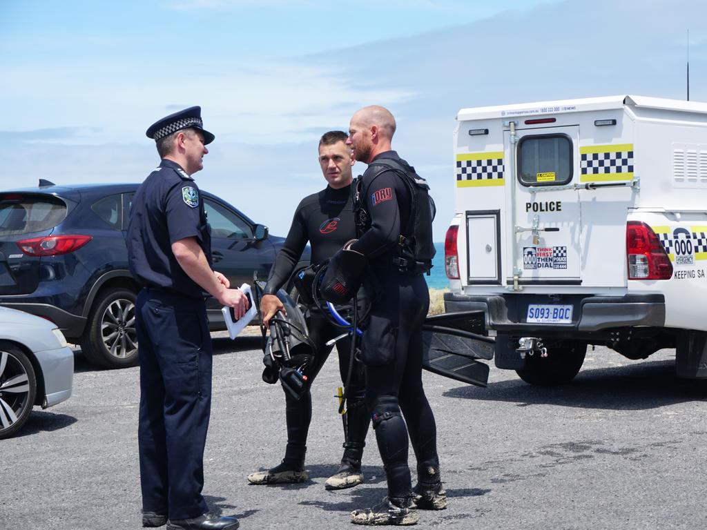 Police divers with Limestone Coast Police operation manager Campbell Hill after searching for the Victorian man missing off the coast near Port MacDonnell. Picture: Jessica Ball