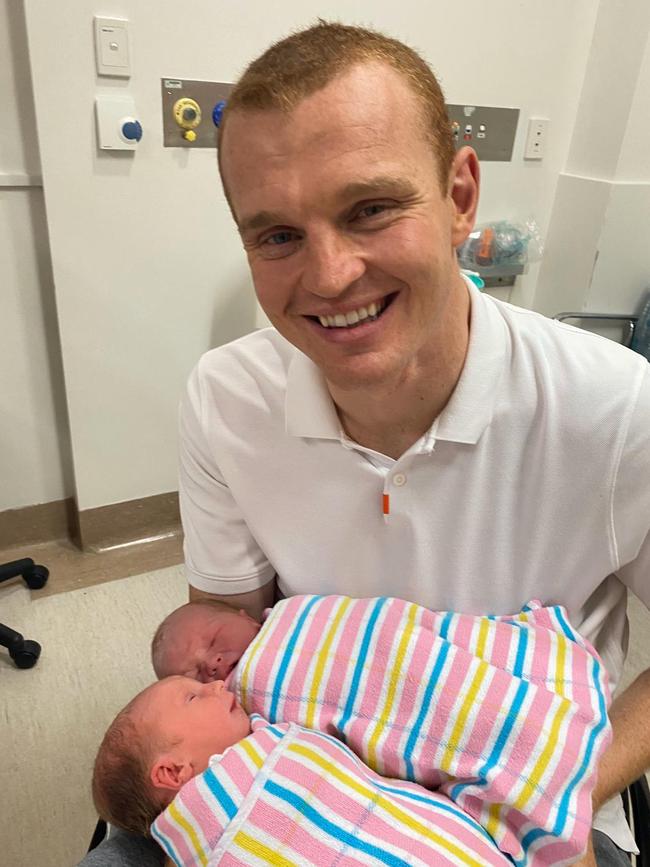 Alex McKinnon and wife Teigan with their twins
