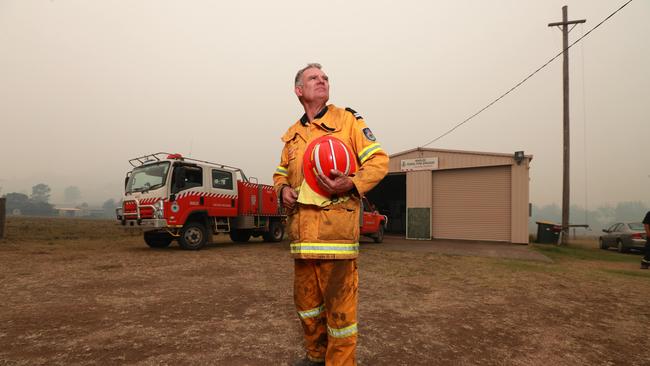 Volunteer firefighters will be paid up to $300 a day to cover lost income while fighting fires. Pictured is RFS volunteer Ken Cameron Picture: News Corp